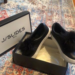 J Slides black slip on sneakers